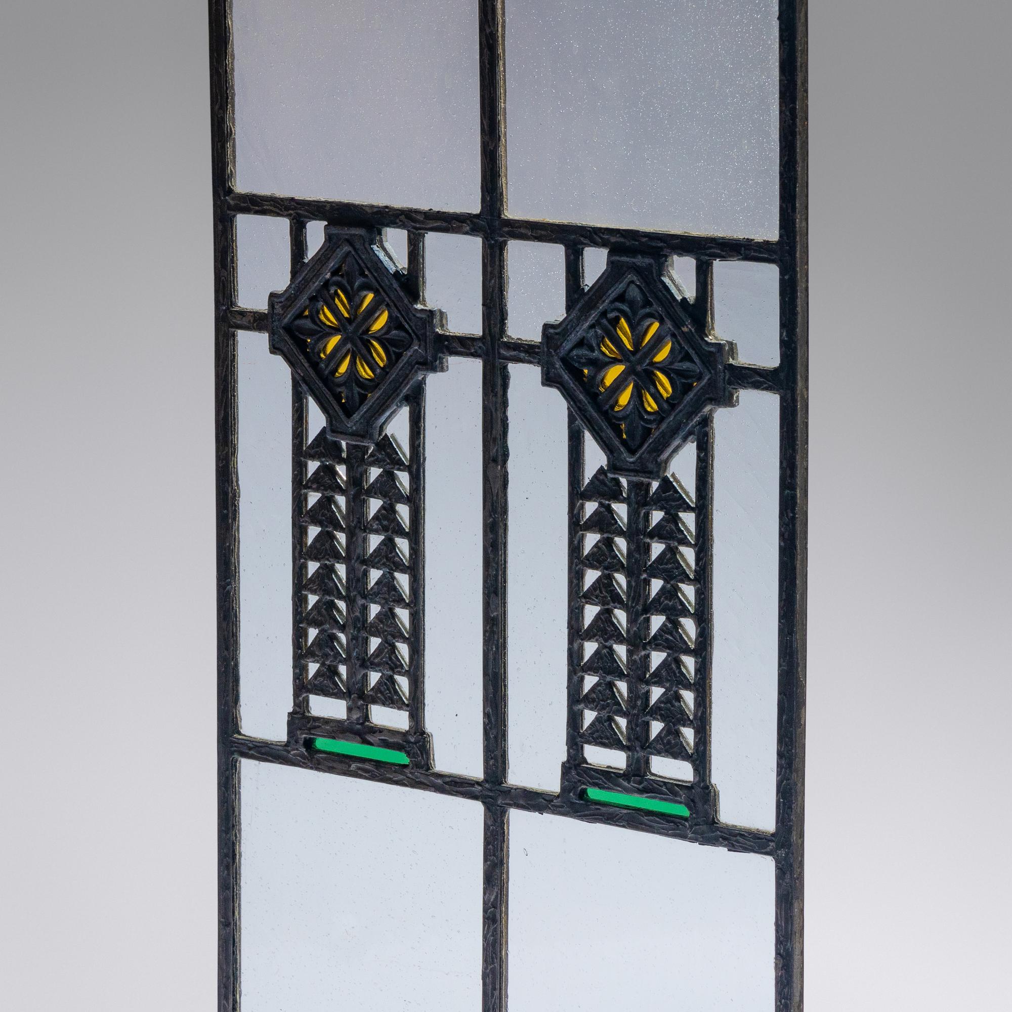Window with cast quatrefoil medallion