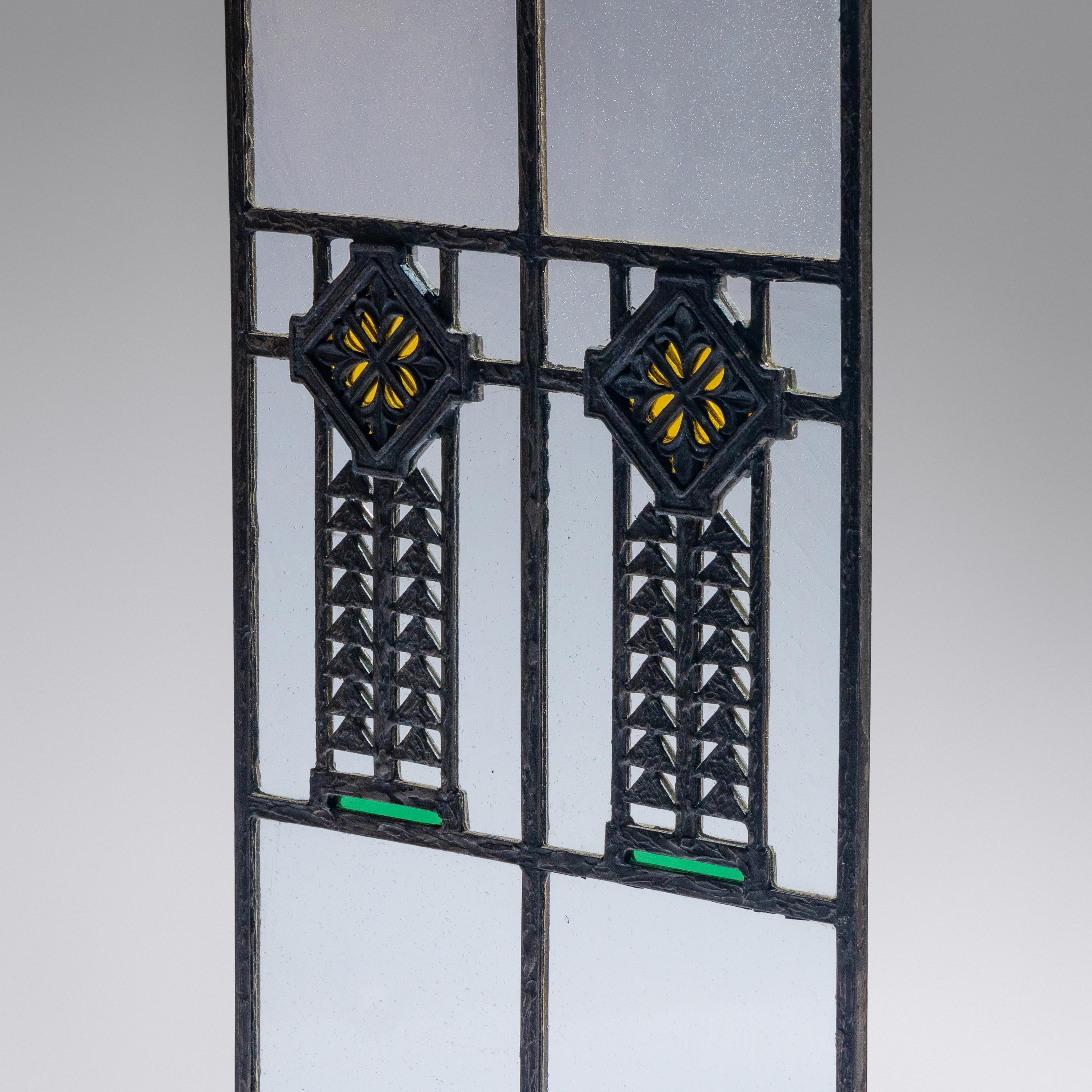 Window with cast quatrefoil medallion