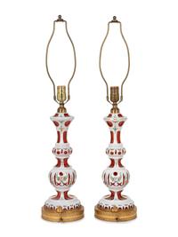 A Pair of Bohemian Enameled White Overlay Ruby Glass Lamps