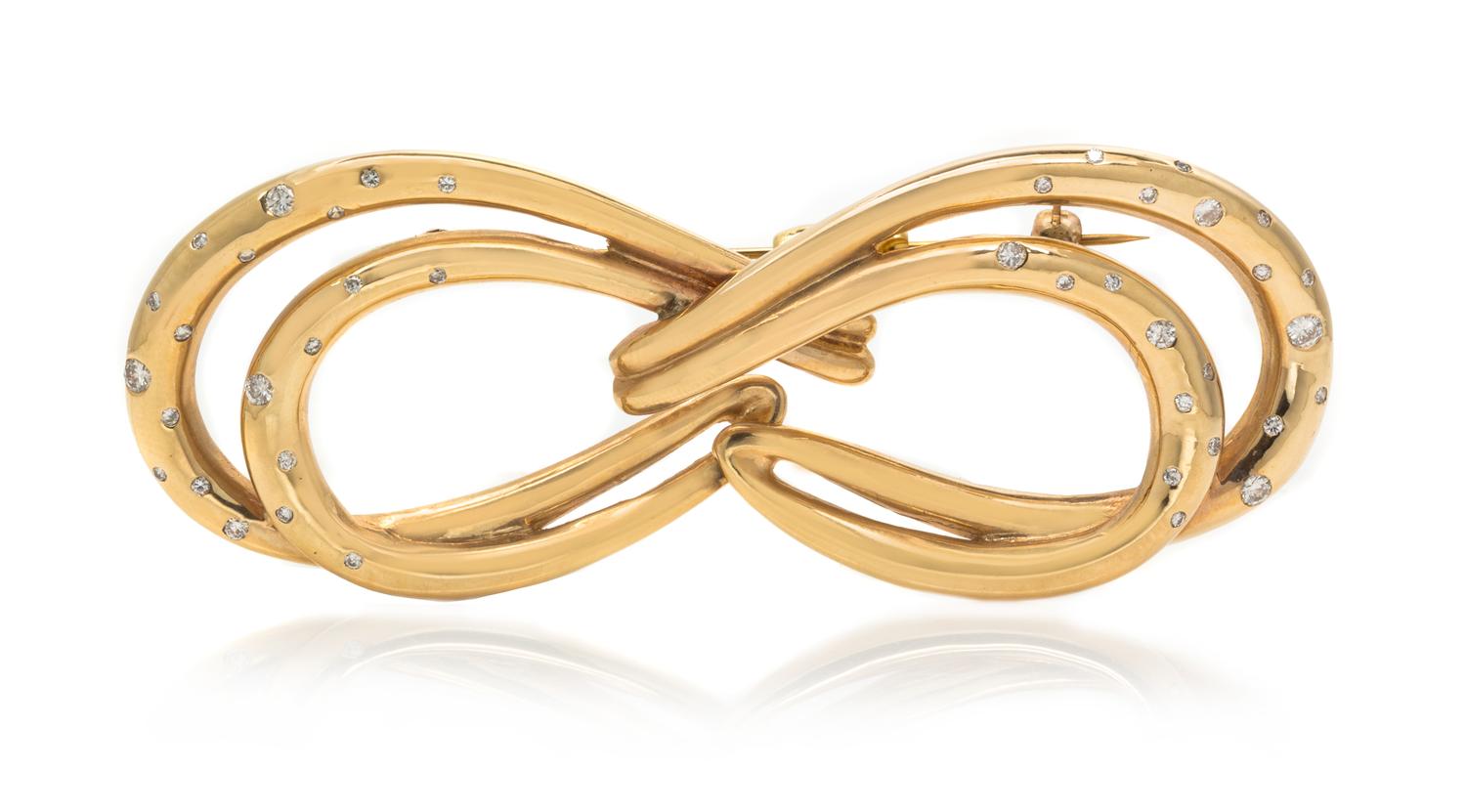 A Yellow Gold and Diamond Brooch, 21.80 dwts.