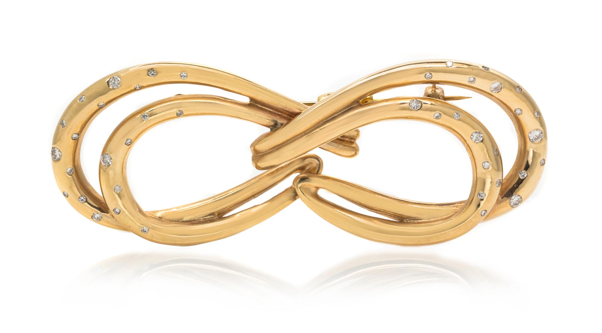 A Yellow Gold and Diamond Brooch, 21.80 dwts.