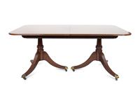 A Regency Style Mahogany Two-pedestal Dining Table by Baker — 20TH CENTURY