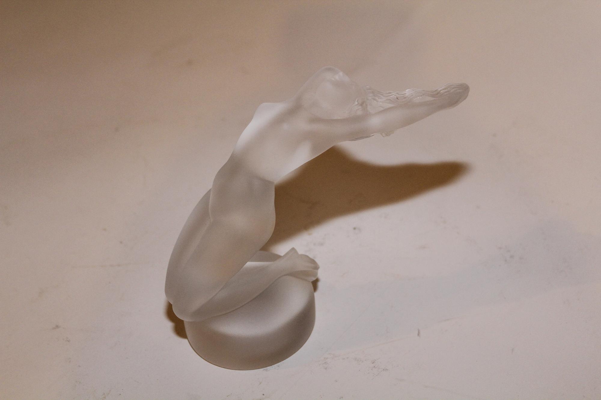 A Lalique Molded and Frosted Glass Figure Height 5 1/4 inches. — SECOND HALF 20TH CENTURY
