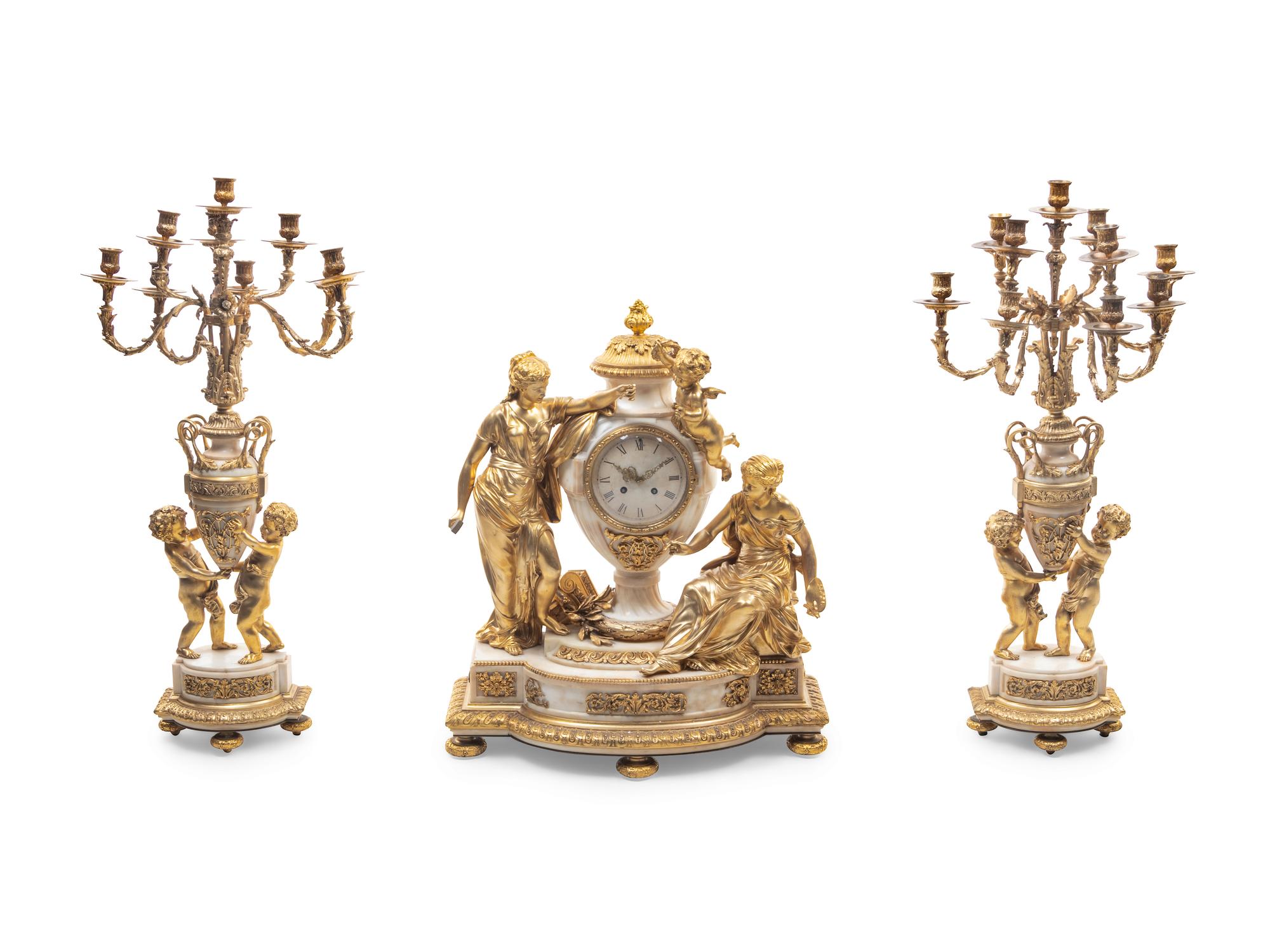 A Large and Impressive Louis XVI Style Gilt Bronze and Marble Clock Garniture