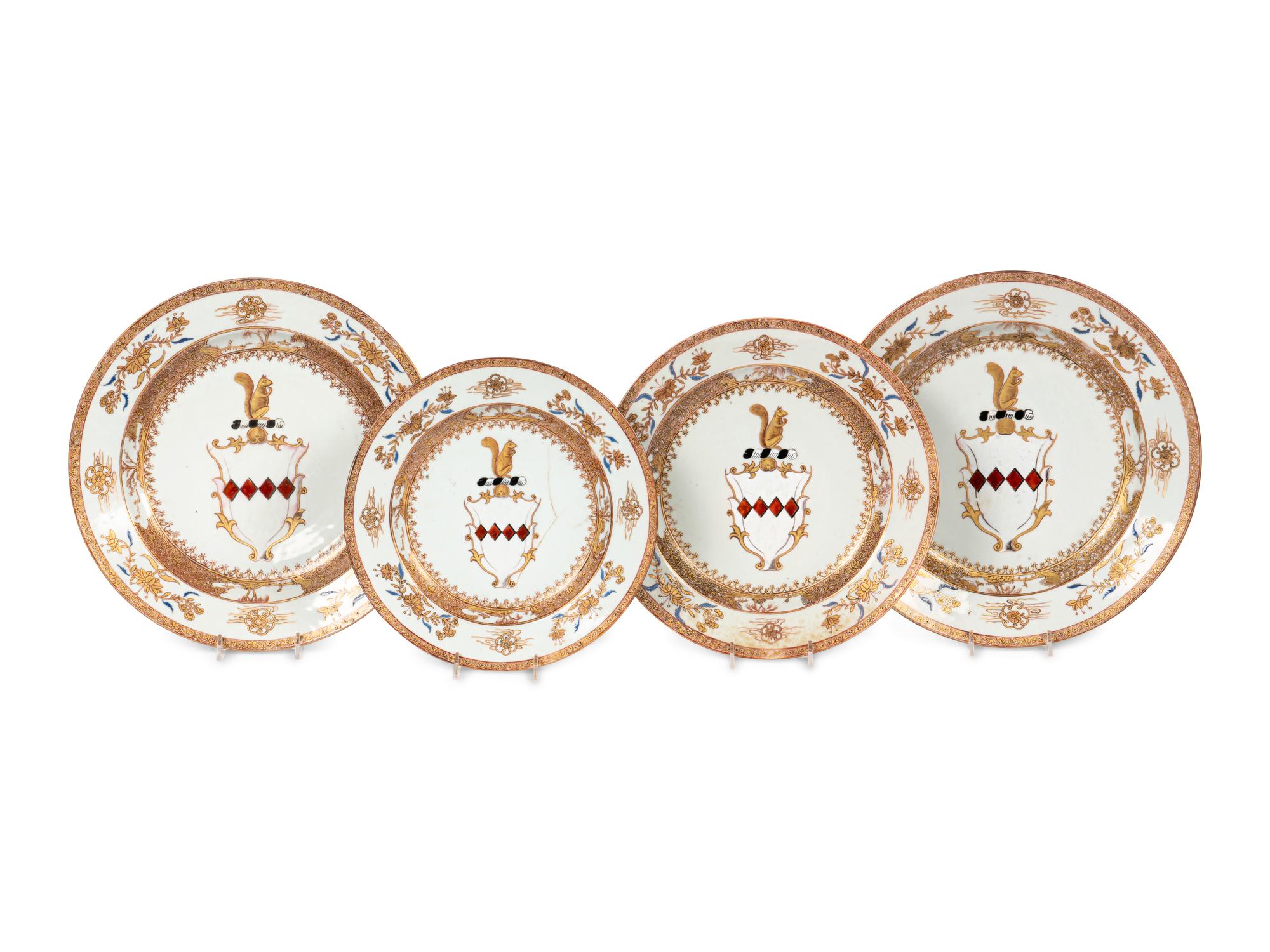 Four Export Armorial Porcelain Plates