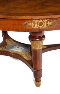 A French Gilt Bronze and Jasperware Mounted Burlwood Dining Suite