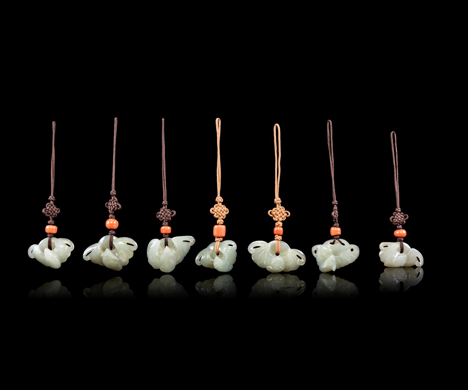 Seven Chinese Celadon Jade Bat-Form Pendants