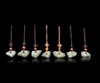 Seven Chinese Celadon Jade Bat-Form Pendants