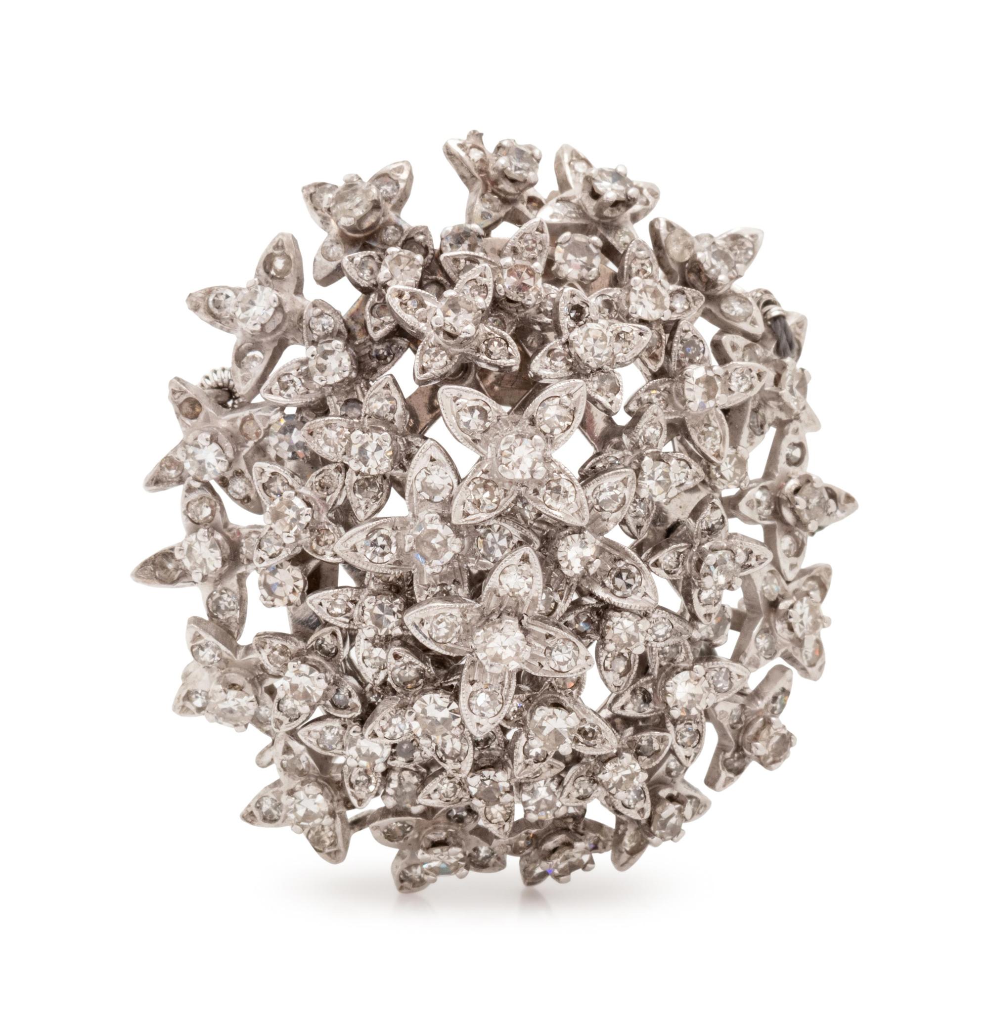 A Platinum and Diamond En Tremblant Pendant/Enhancer,