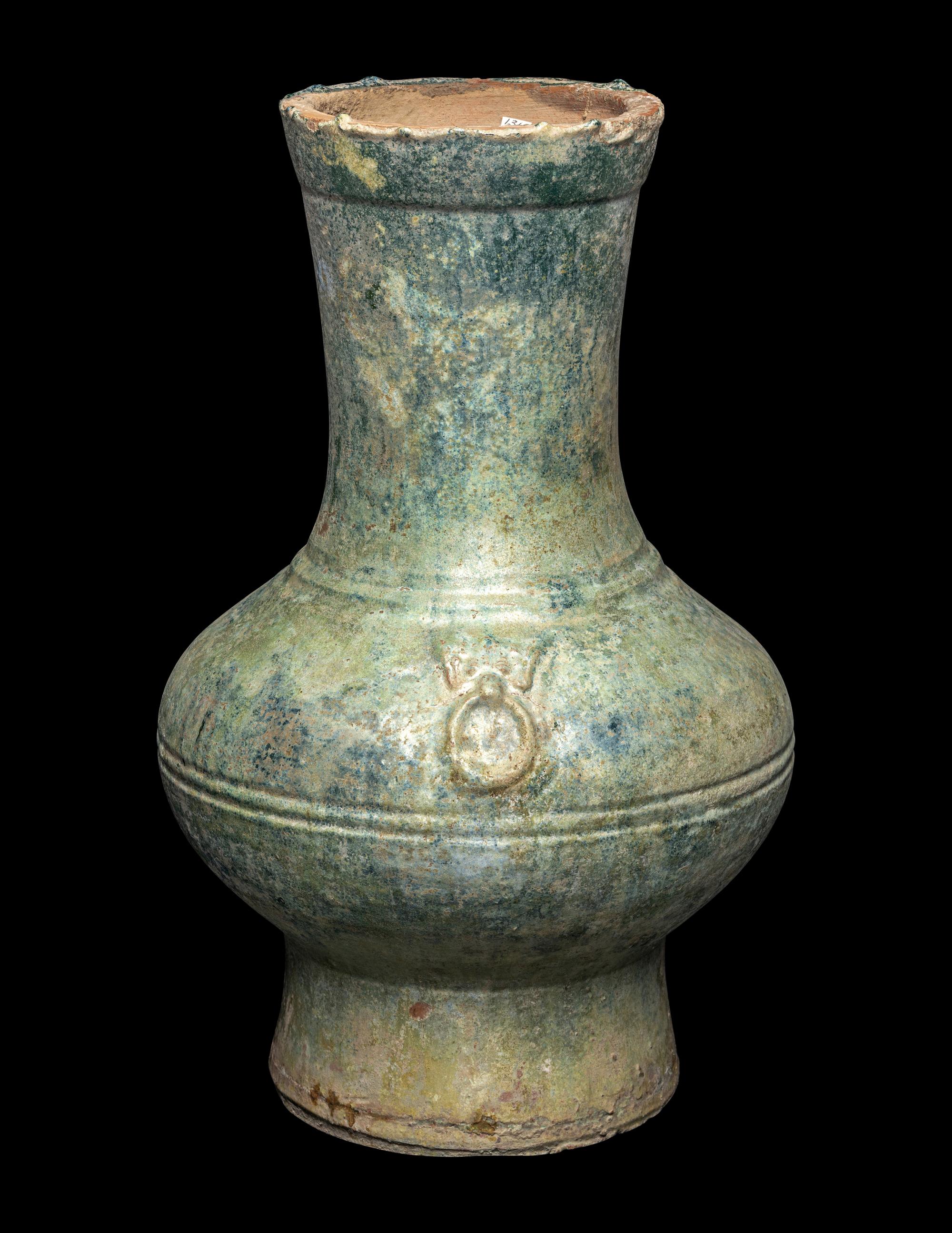 A Chinese Green Glazed Pottery Hu Vase