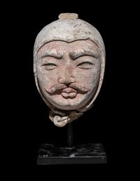 A Chinese Painted Potter Head of a Warrior