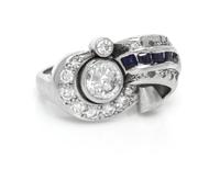 A Platinum Diamond and Sapphire Retro Ring, 8.10 dwts.