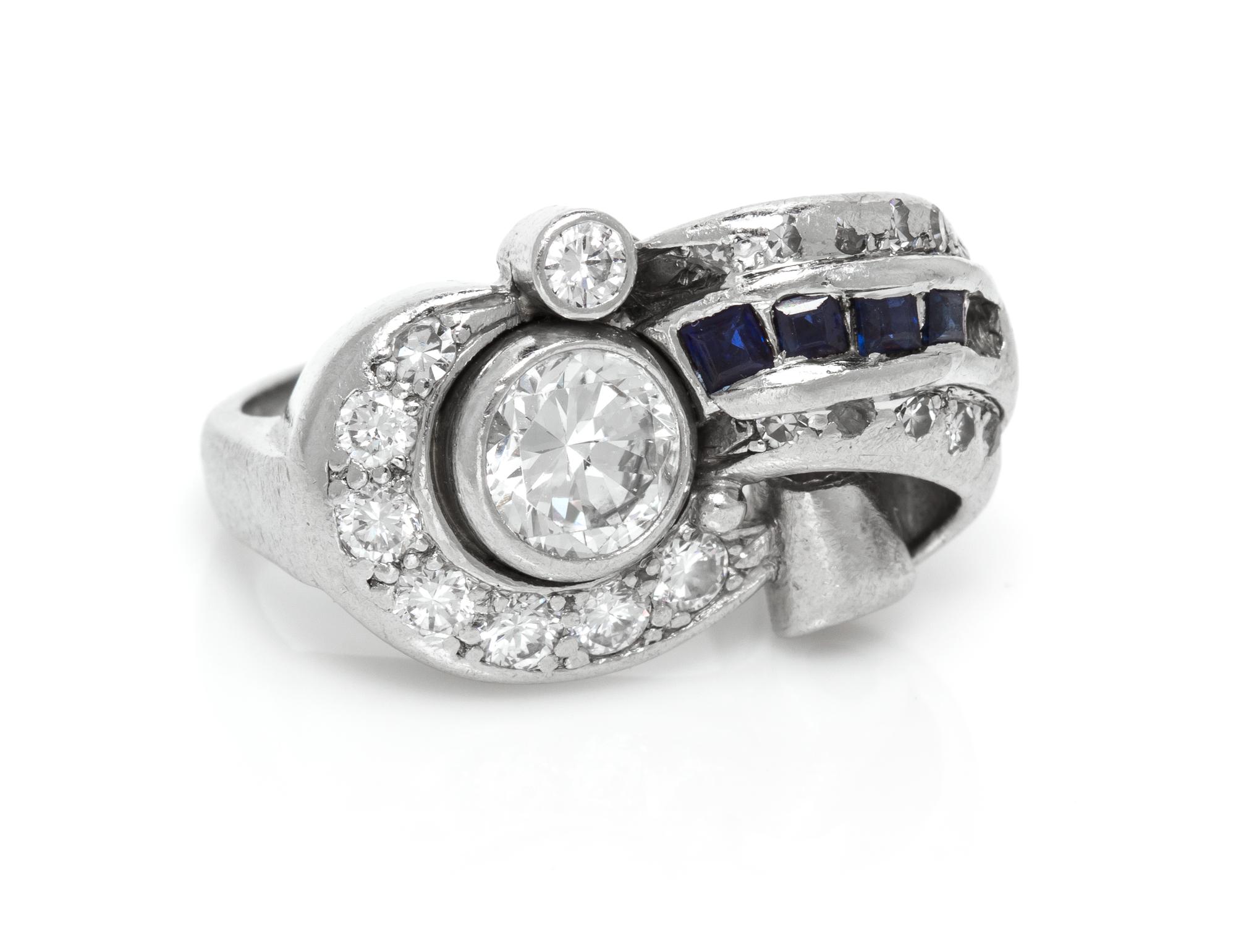 A Platinum Diamond and Sapphire Retro Ring, 8.10 dwts.