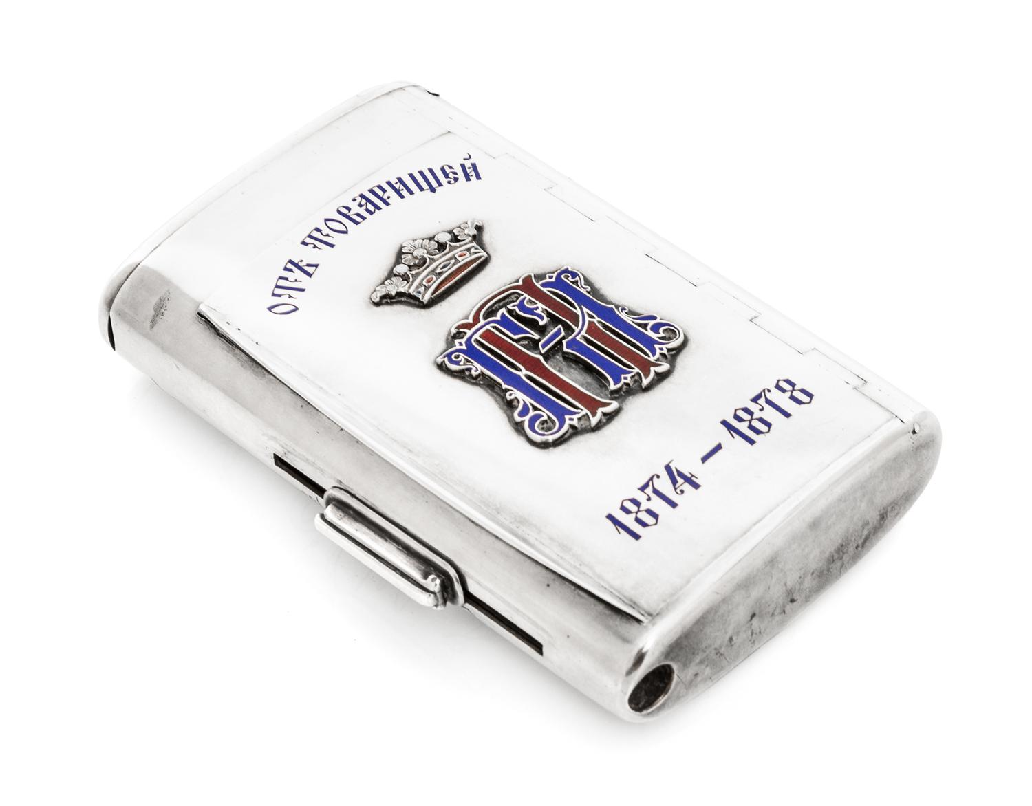 A Russian Silver and Enamel Cigarette Case, Mark of Sazikov with Imperial warrant, St. Petersburg, late 19th century, the lid with an a