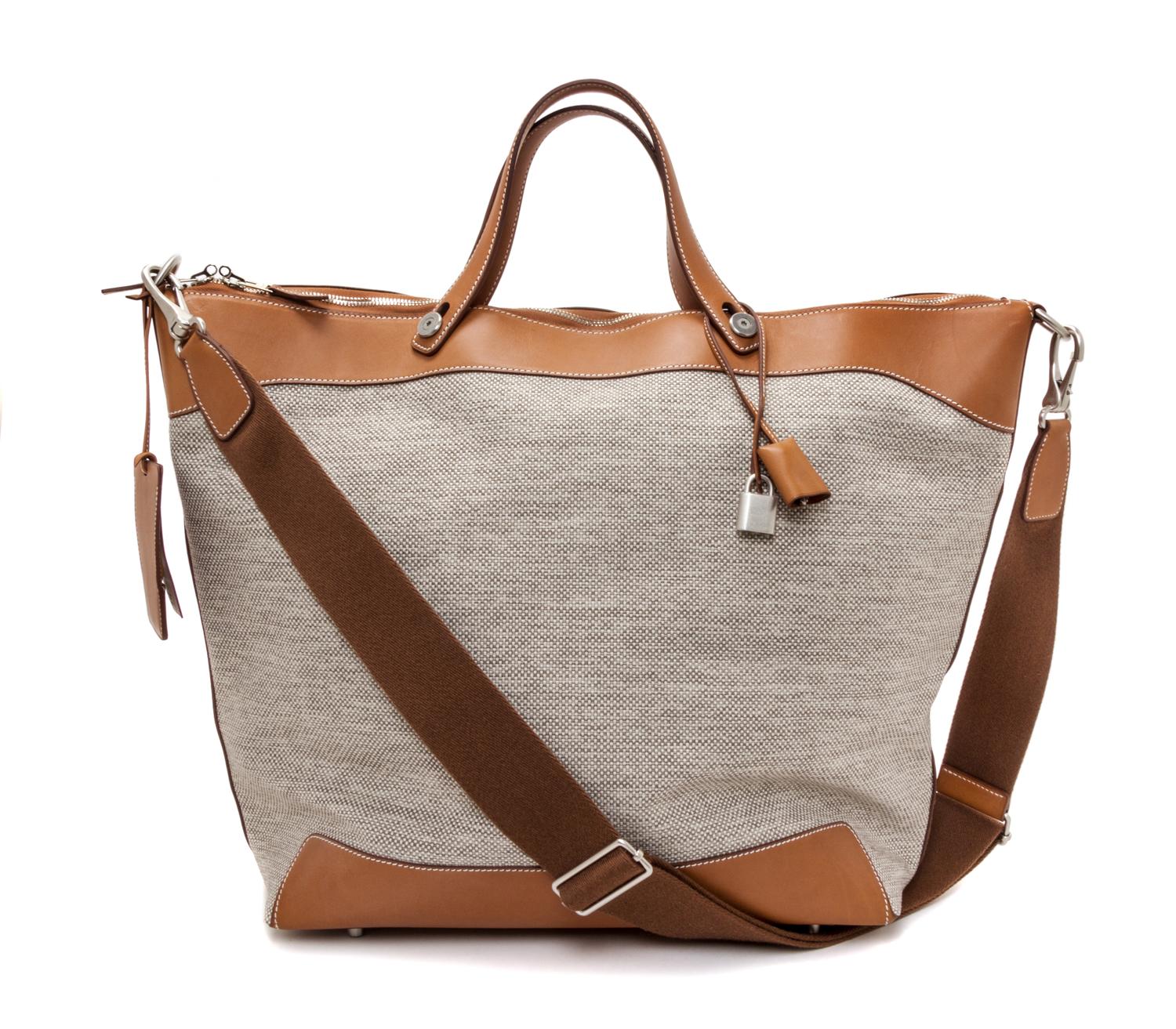 An Hermes Ecru Canvas and Fawn Barenia Calfskin Caleche-Express Medium Tote, 15.3" 14.1" 7.8".