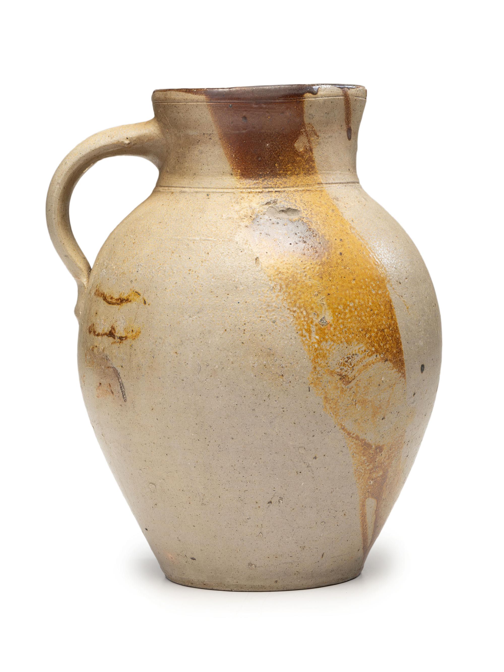A Slip-Glazed Stoneware Pitcher