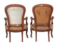 A Pair of Victorian Rococo Revival Walnut Armchairs