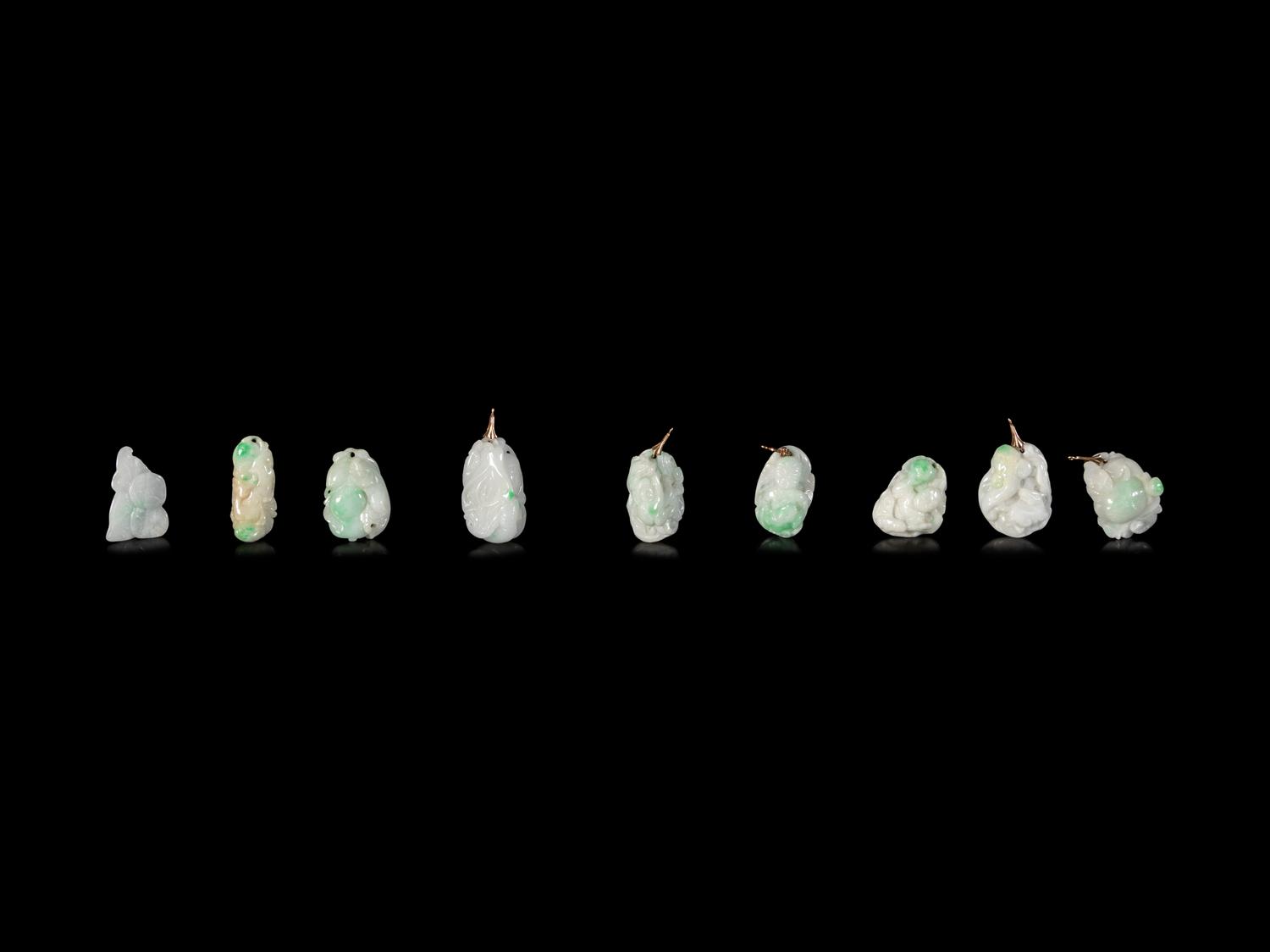 Fourteen Chinese Jadeite Pendants