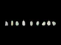 Fourteen Chinese Jadeite Pendants