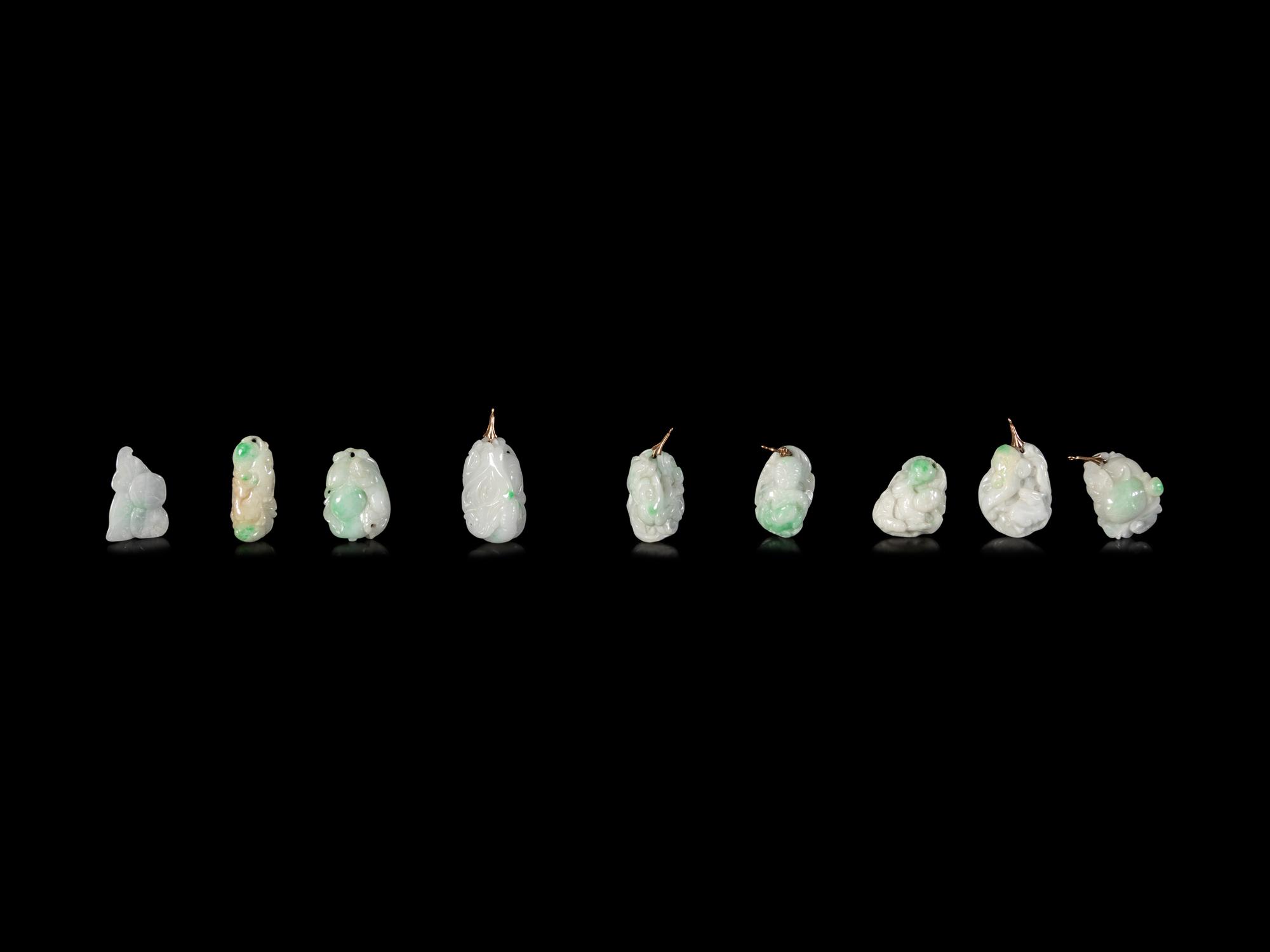 Fourteen Chinese Jadeite Pendants
