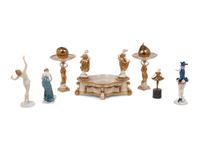 An Assortment of Porcelain and Bronze Figures