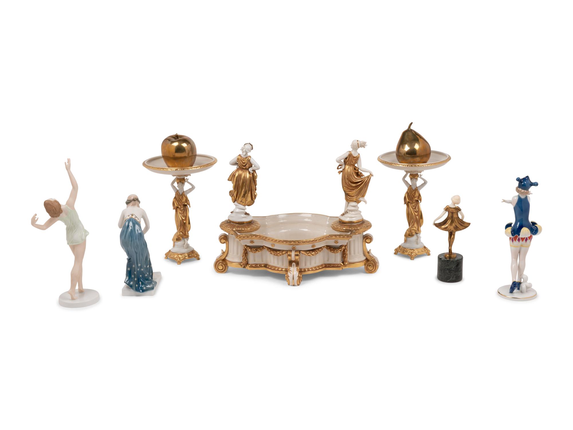 An Assortment of Porcelain and Bronze Figures