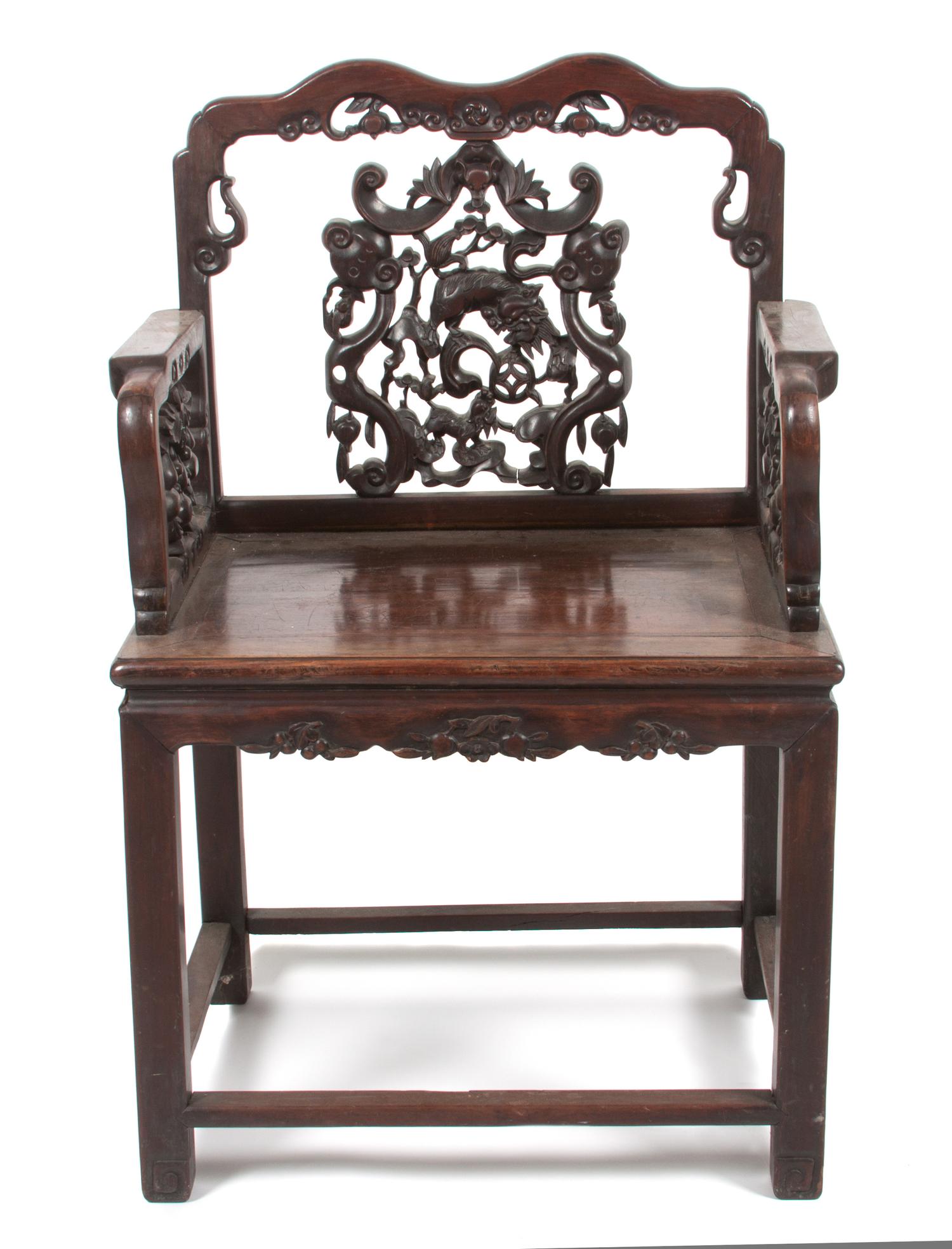 A Chinese Carved Harwood Chair Height 38 1/2 inches.