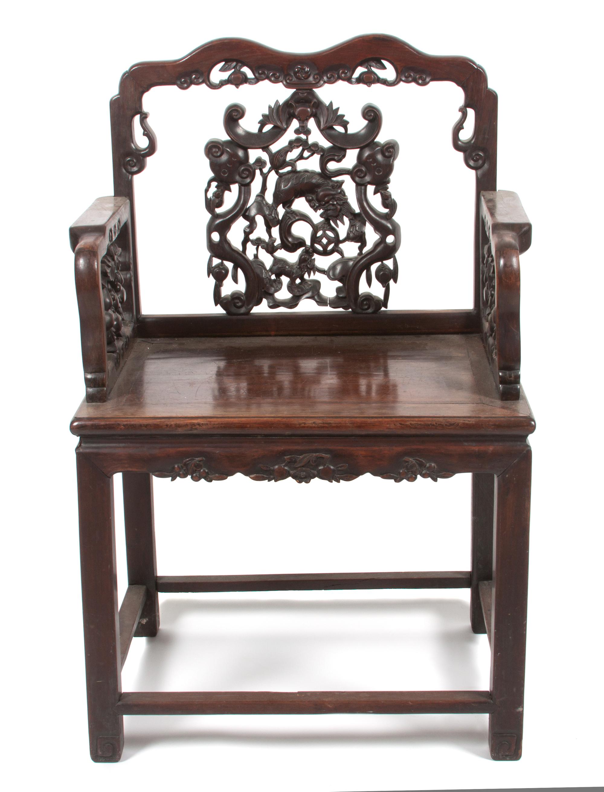 A Chinese Carved Harwood Chair Height 38 1/2 inches.