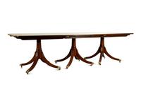 A Regency Style Mahogany Triple Pedestal Dining Table — 20TH CENTURY