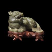 A Chinese Carved Sage Green Jade Mythical Beast, Bixie 青玉辟邪