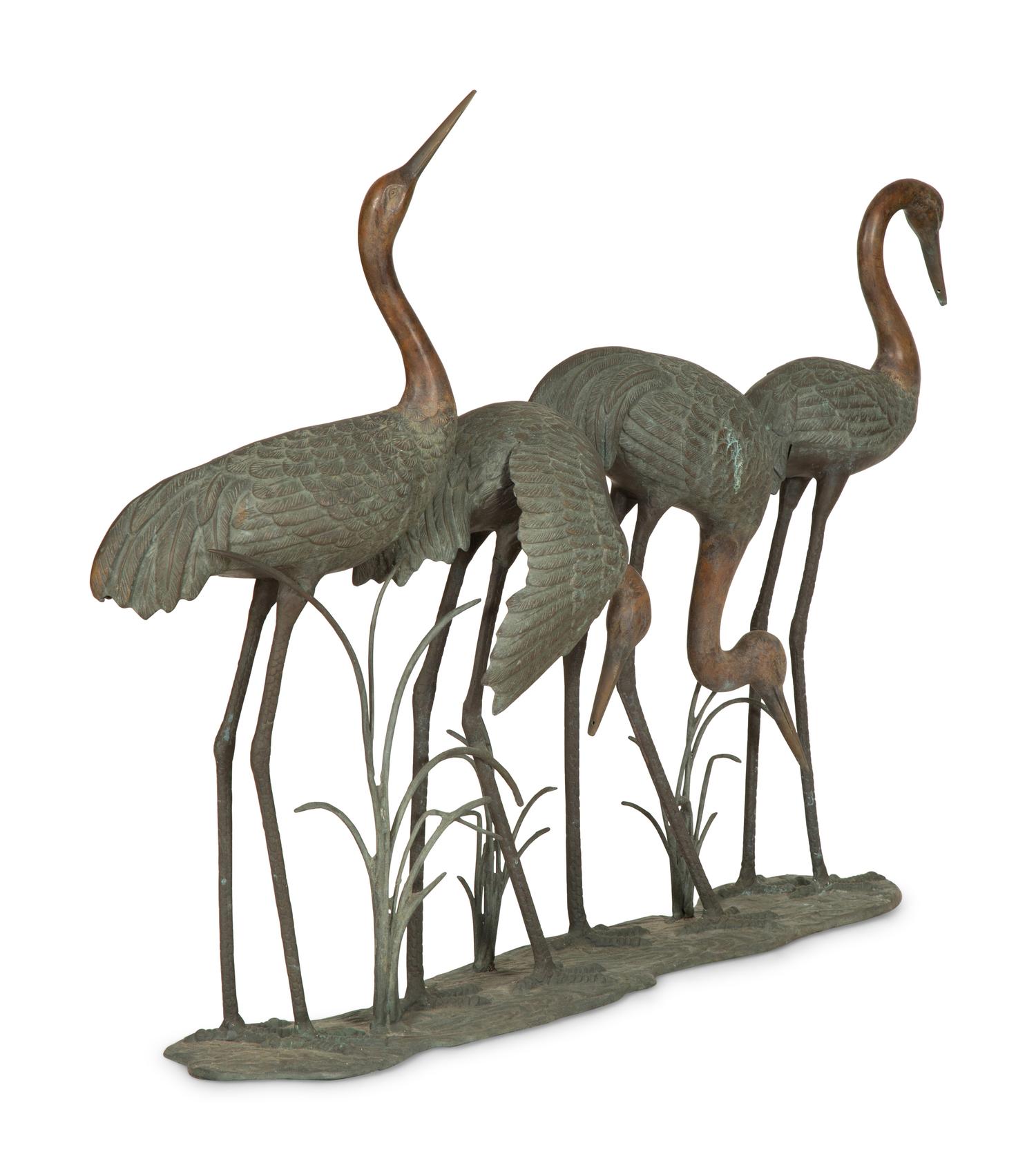 A Bronze Sculpture of Four Standing Cranes