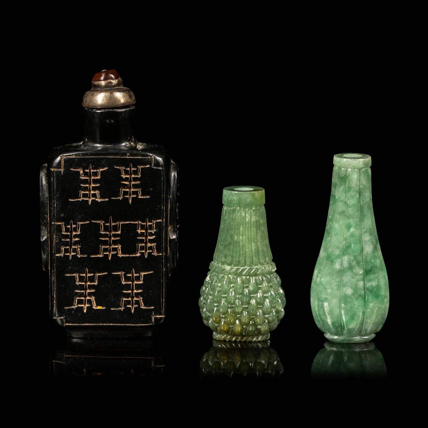 Three Chinese Hardstone Snuff Bottles