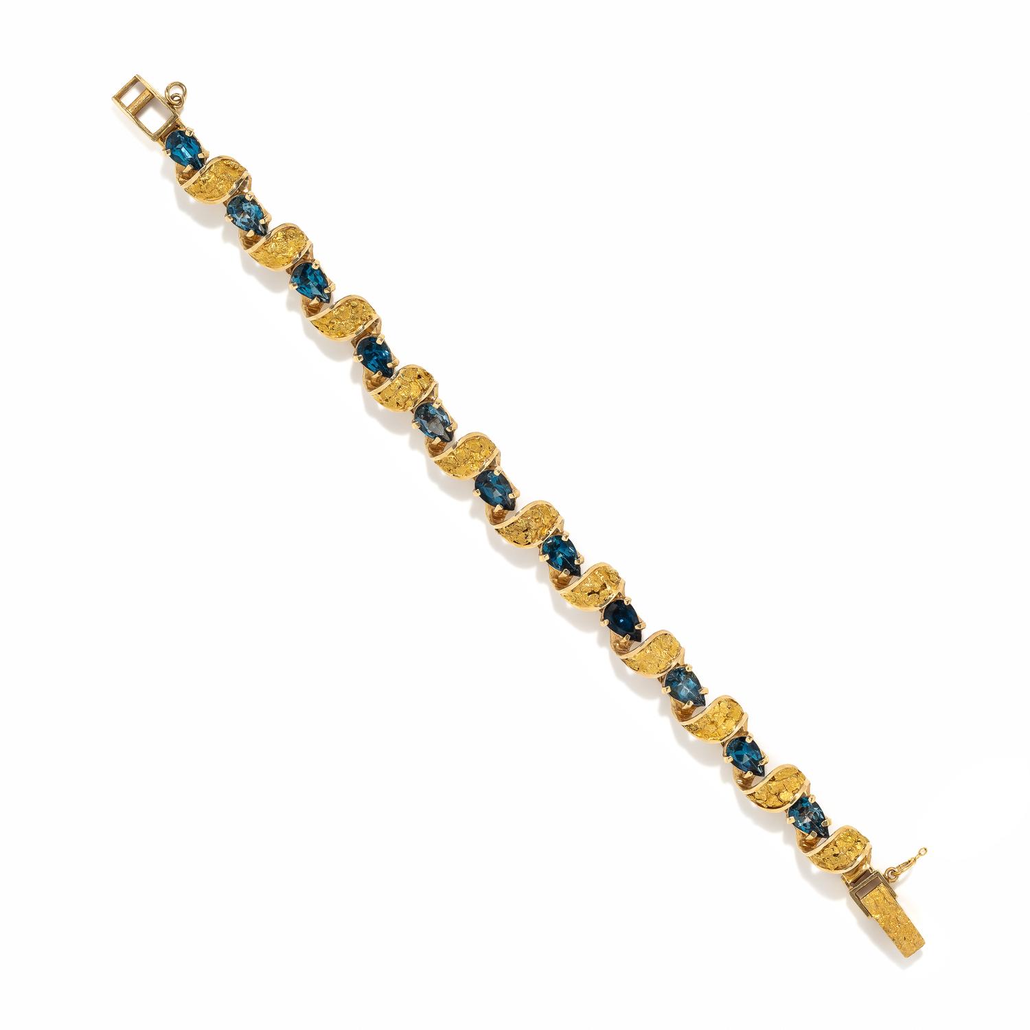 YELLOW GOLD AND BLUE TOPAZ BRACELET