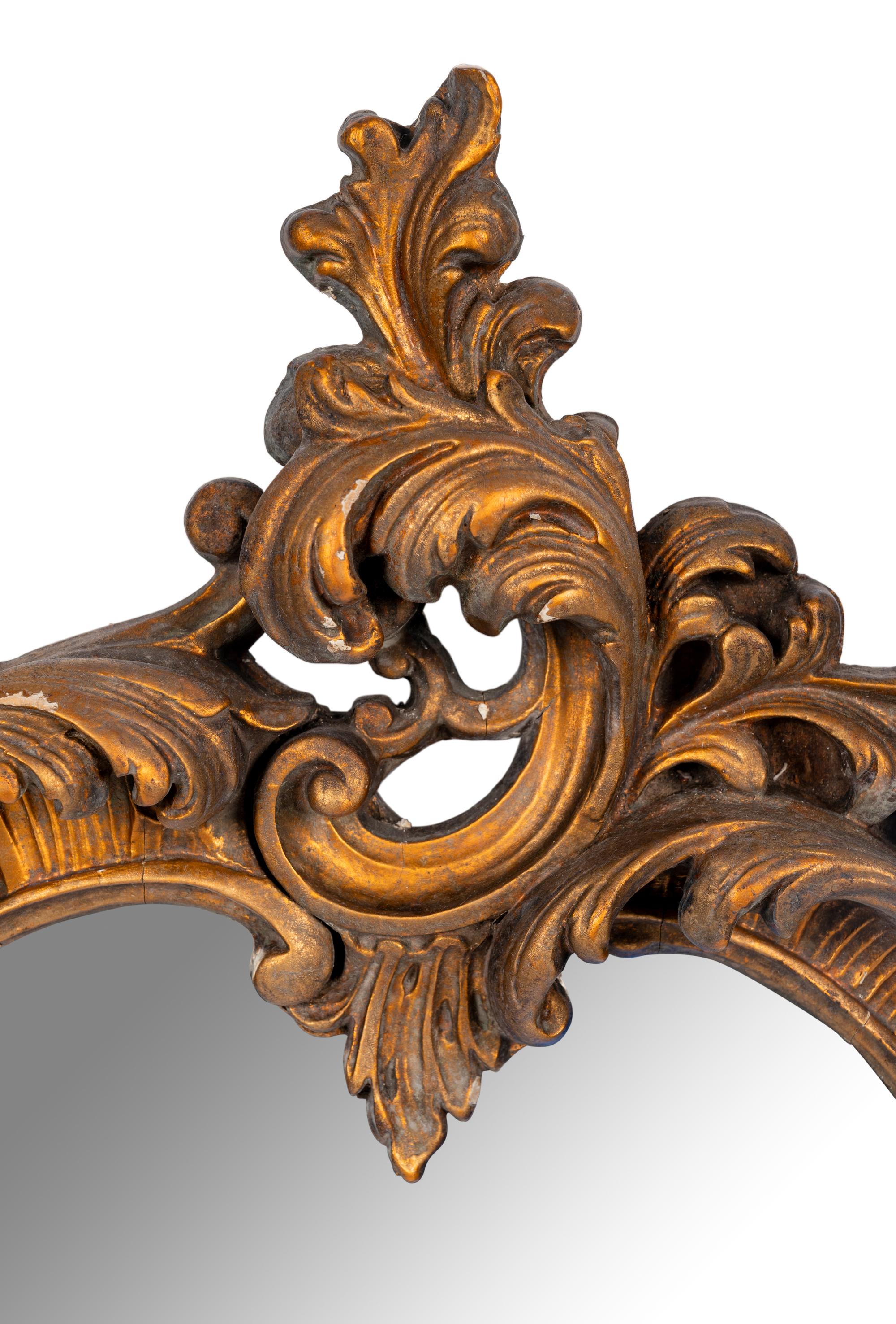 A Pair of Italian Rococo Style Giltwood Mirrors
