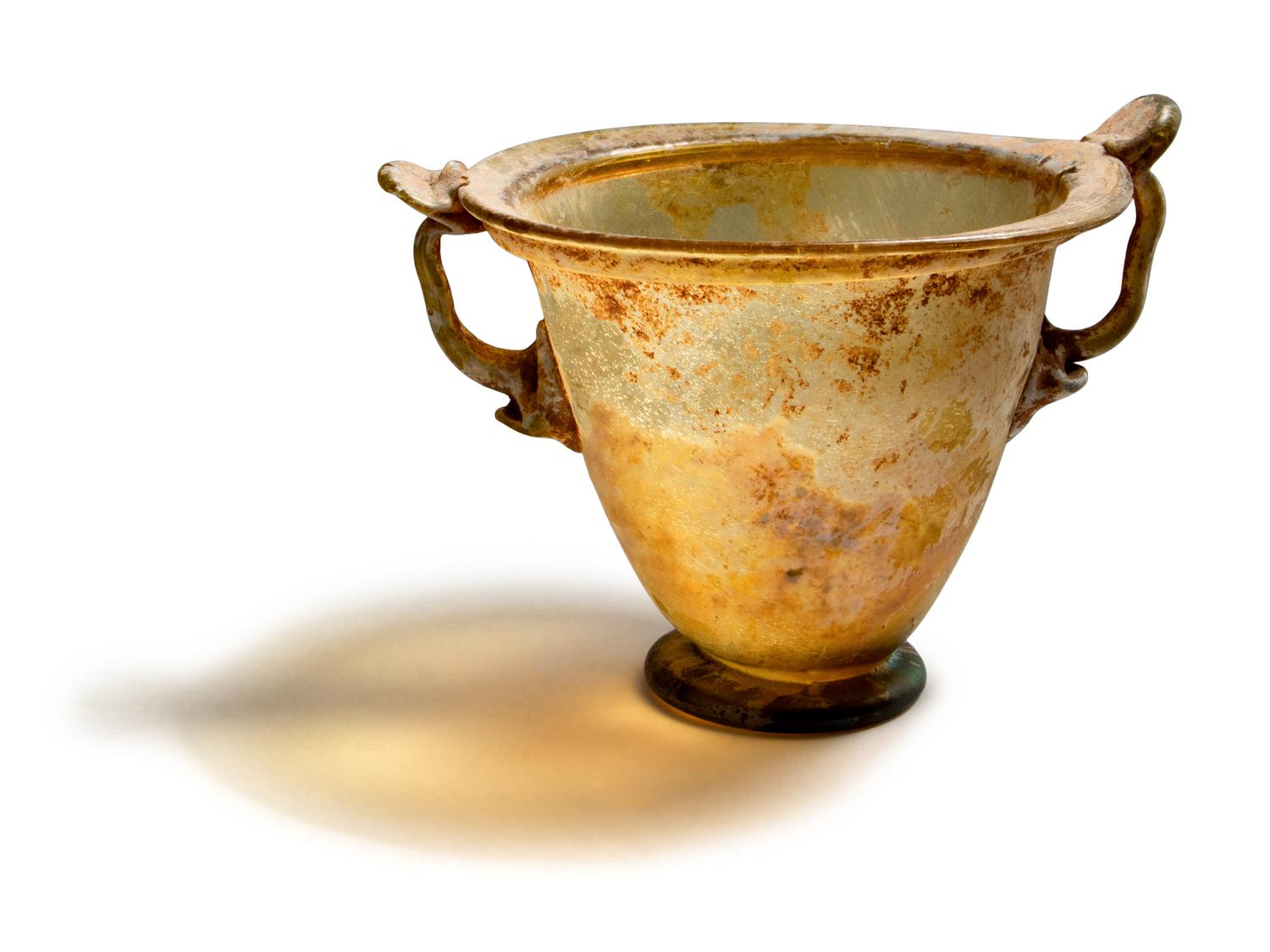 A Roman Yellow Glass Skyphos