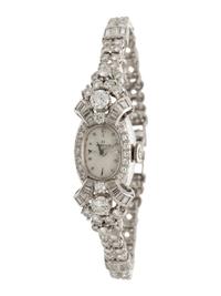 OMEGA, PLATINUM AND DIAMOND WATCH