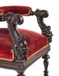 A Set of Ten Renaissance Revival Oak Dining Chairs
