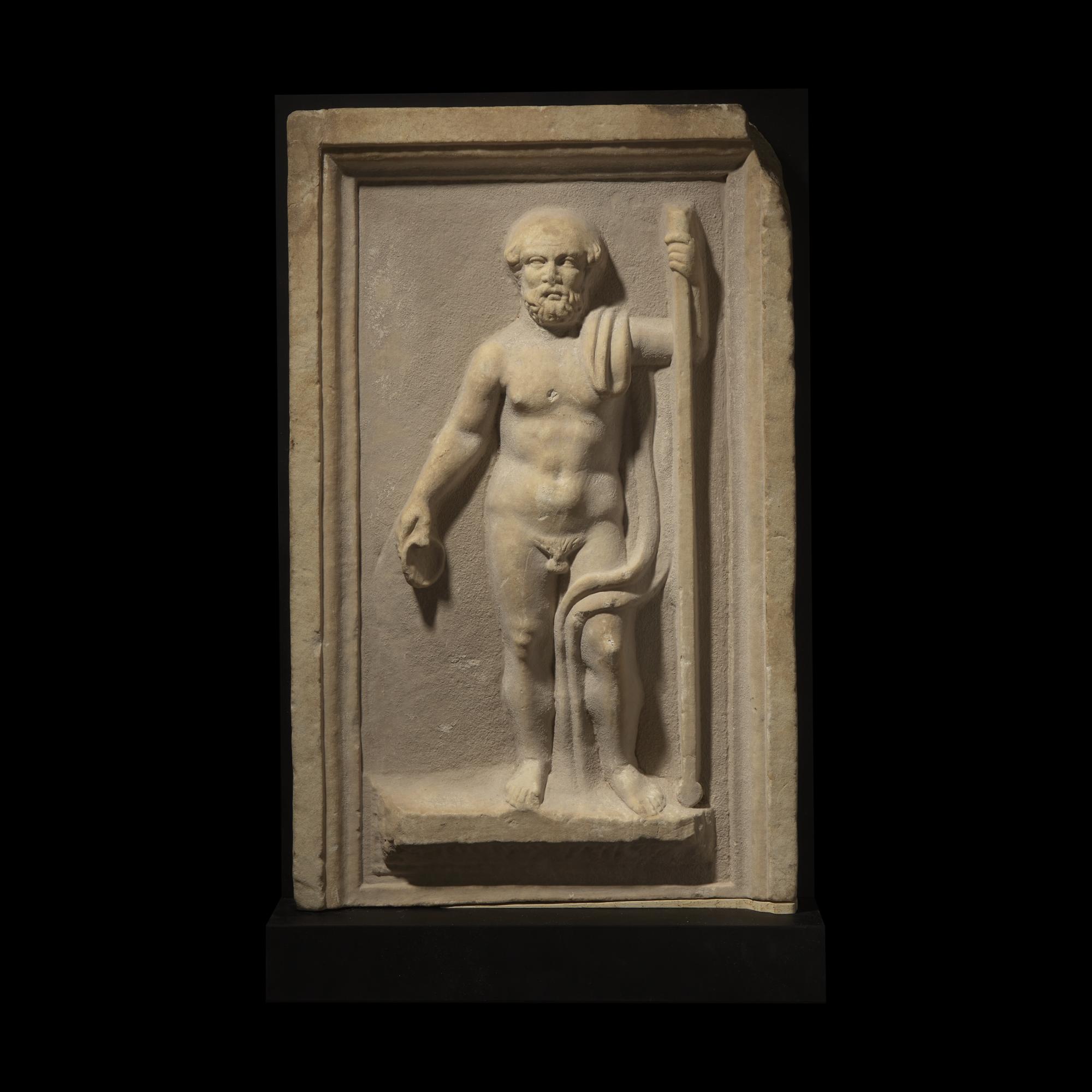 A Roman Marble Panel with Silenus