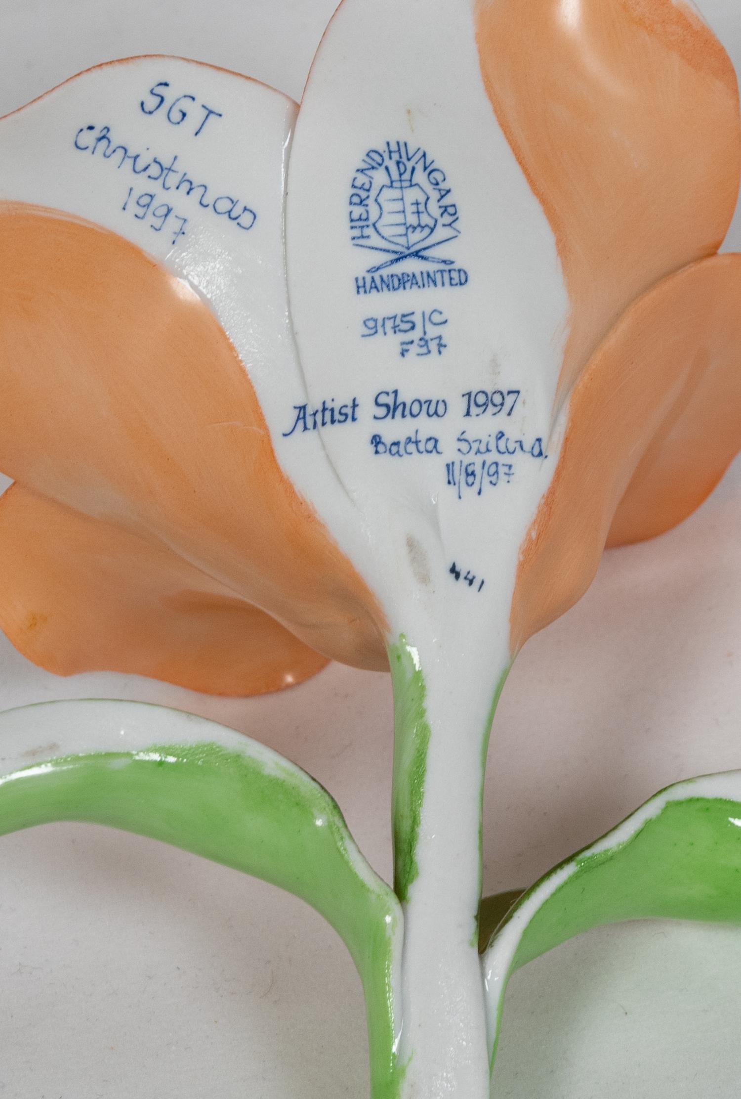 A Collection of Five Ceramic and Porcelain Flowers