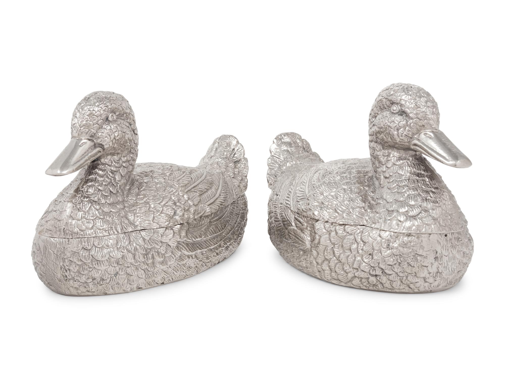 A Pair of Silvered Metal Duck-Form Boxes
