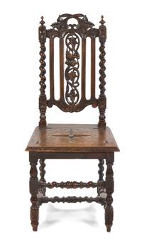 A Renaissance Revival Carved Oak Side Chair, Height 42 1/2 inches.