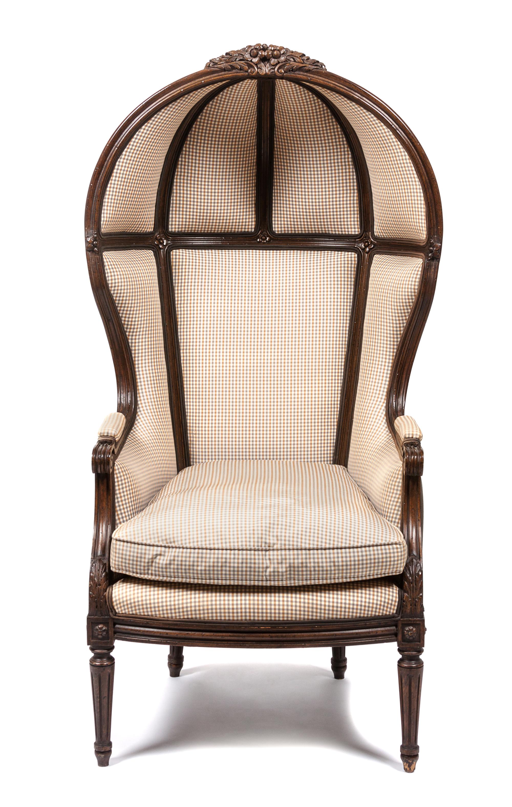 A Louis XVI Style Walnut Porter's Chair Height 55 inches. — 19TH CENTURY