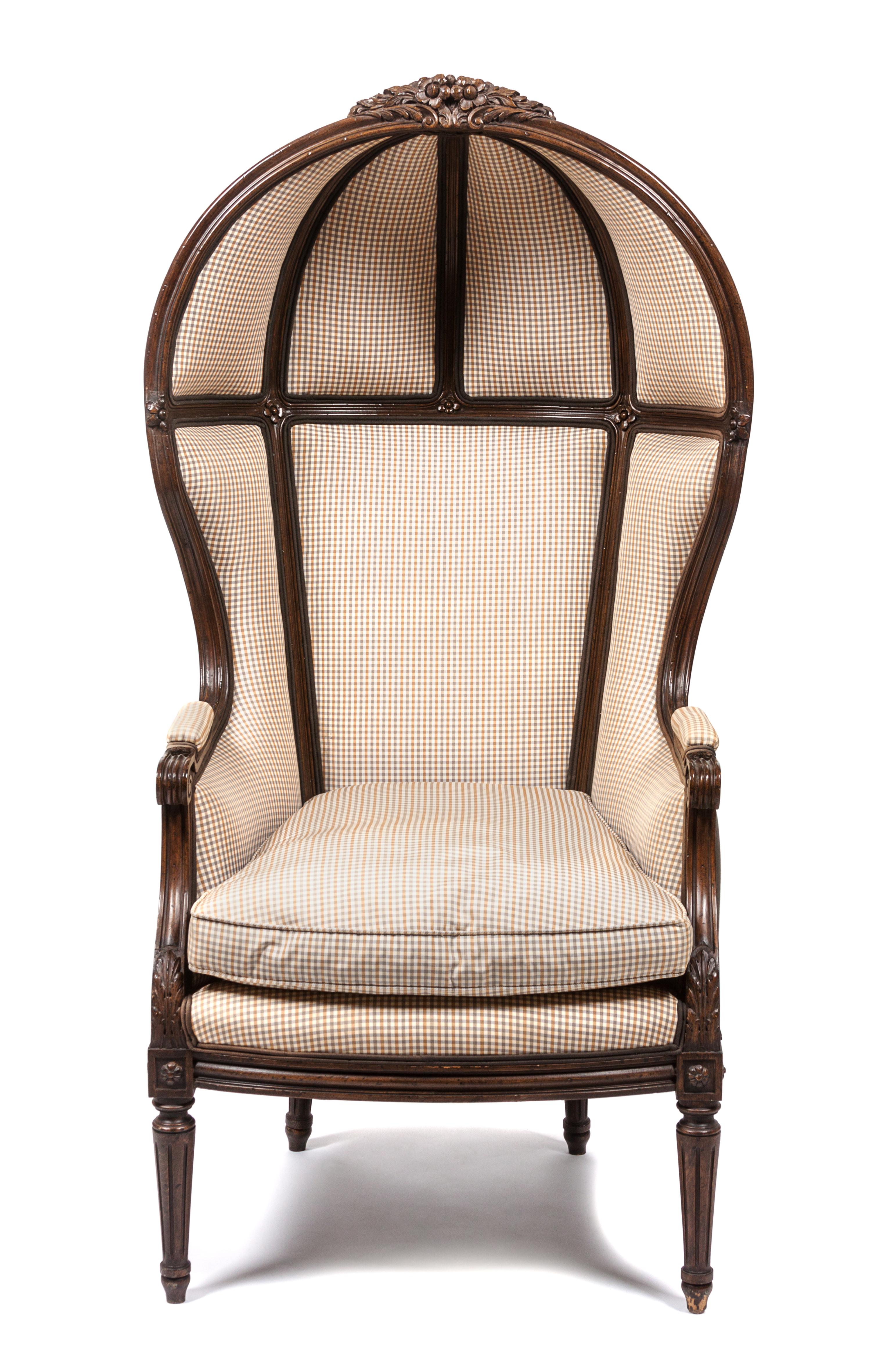 A Louis XVI Style Walnut Porter's Chair Height 55 inches. — 19TH CENTURY