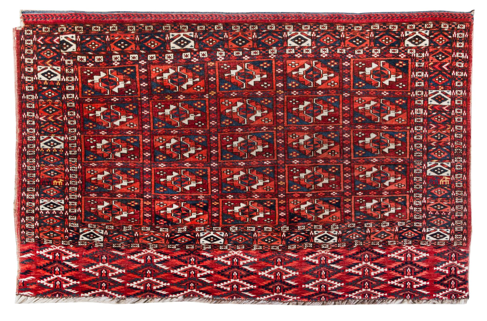 A Turkoman Wool Rug 3 feet 10 inches x 2 feet 2 inches. — FIRST HALF 20TH CENTURY