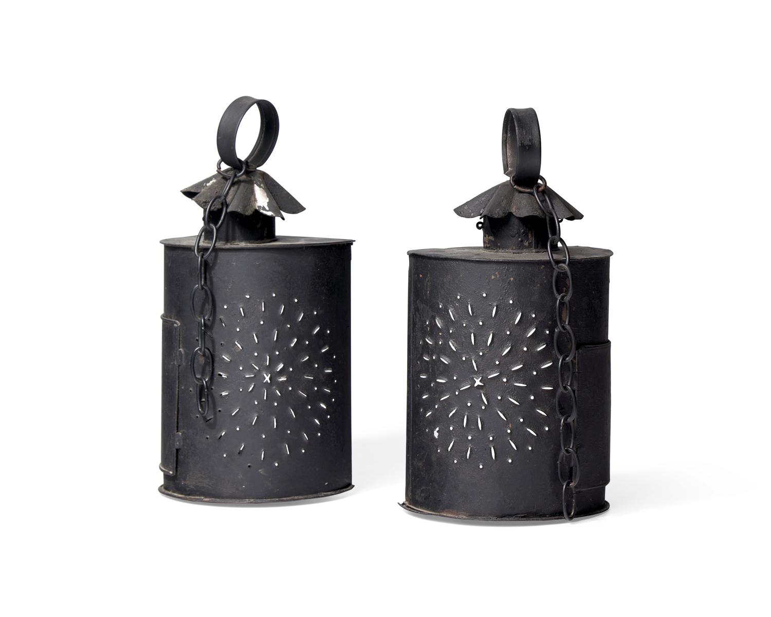 A Pair of Hanging Pierced Tinware and Glass Lanterns