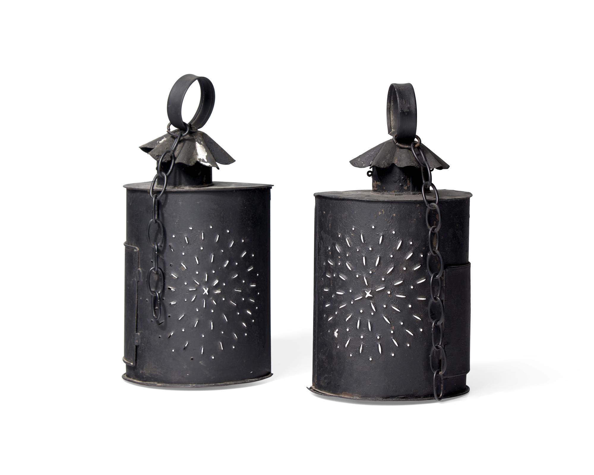 A Pair of Hanging Pierced Tinware and Glass Lanterns