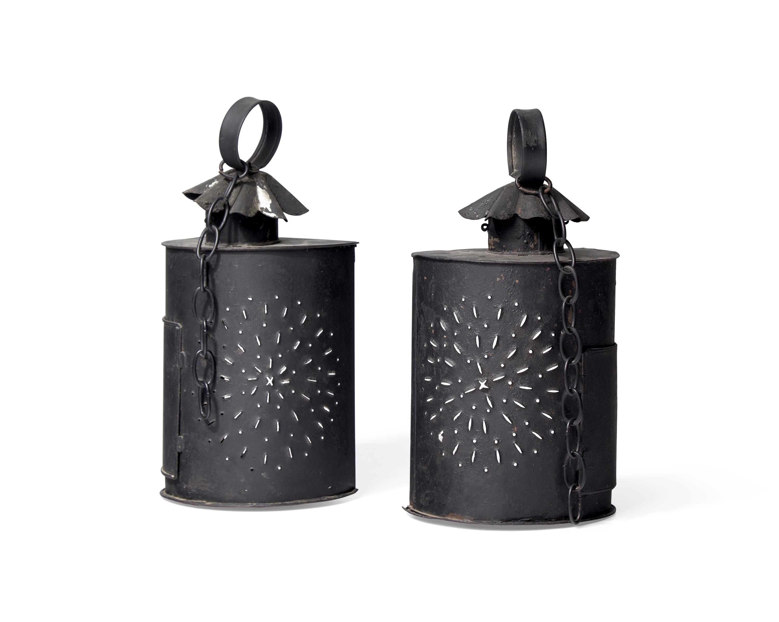 A Pair of Hanging Pierced Tinware and Glass Lanterns