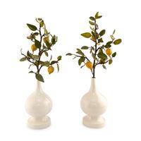 A Pair of White Glazed Earthenware Vases with Painted Tôle Models of Lemon Branches