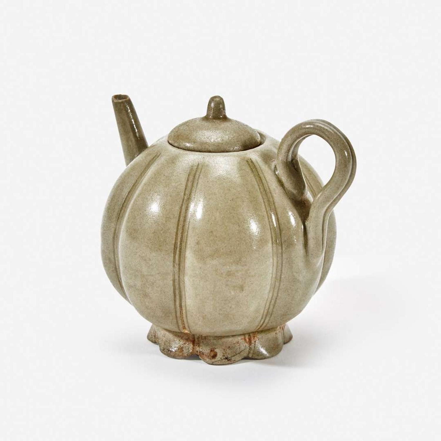 A Chinese celadon-glazed melon-form small ewer and cover Song Dynasty