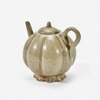 A Chinese celadon-glazed melon-form small ewer and cover Song Dynasty